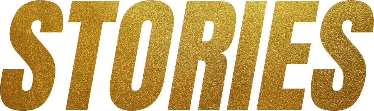Close-up of the word "STORES" written in large, bold, textured gold letters.